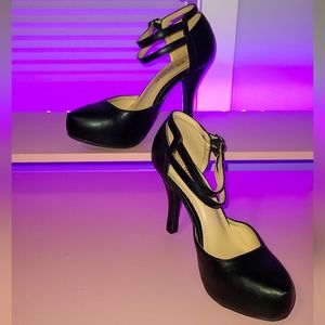 Black platform pumps